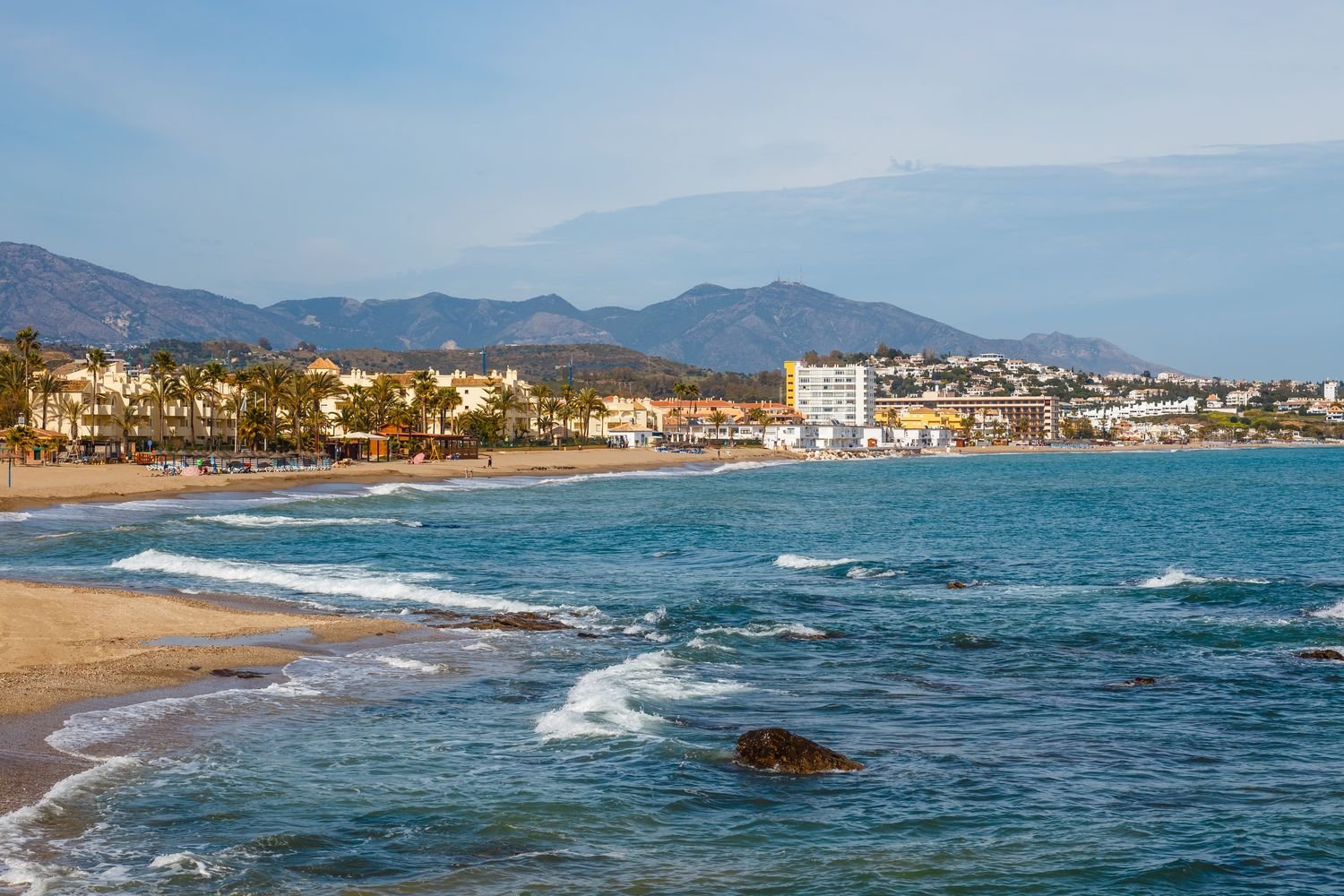 The beach at La Cala de Mijas, with the Sierra de Mijas behind.